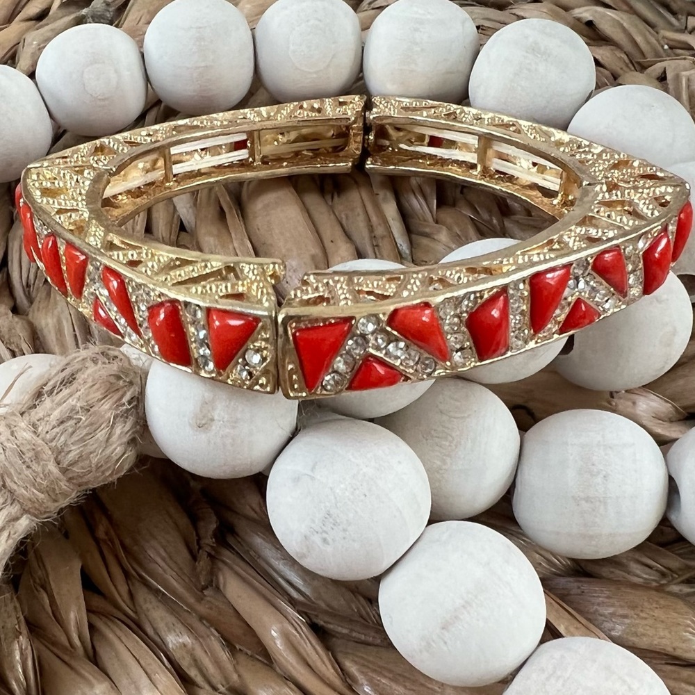 Ladies gold & coral bangle bracelet.